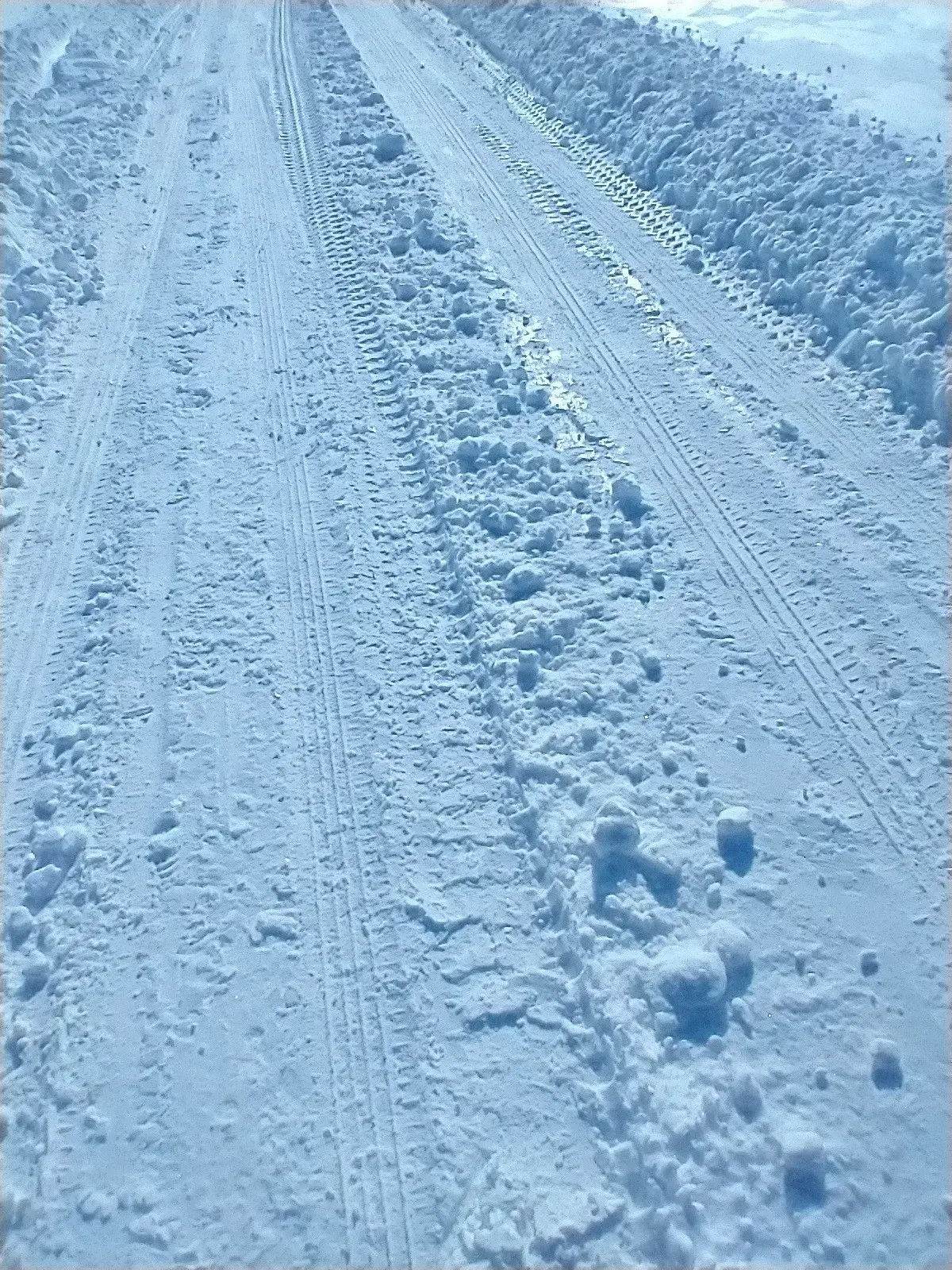 A snow-covered road in Akron, Ohio in winter